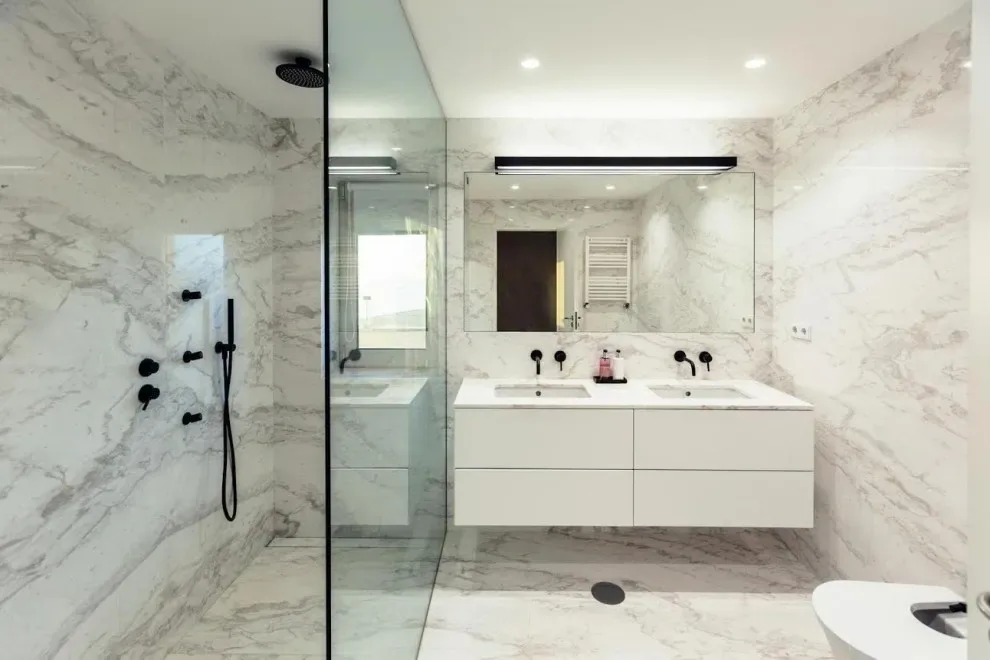 Modern white marble style bathroom with double vanity